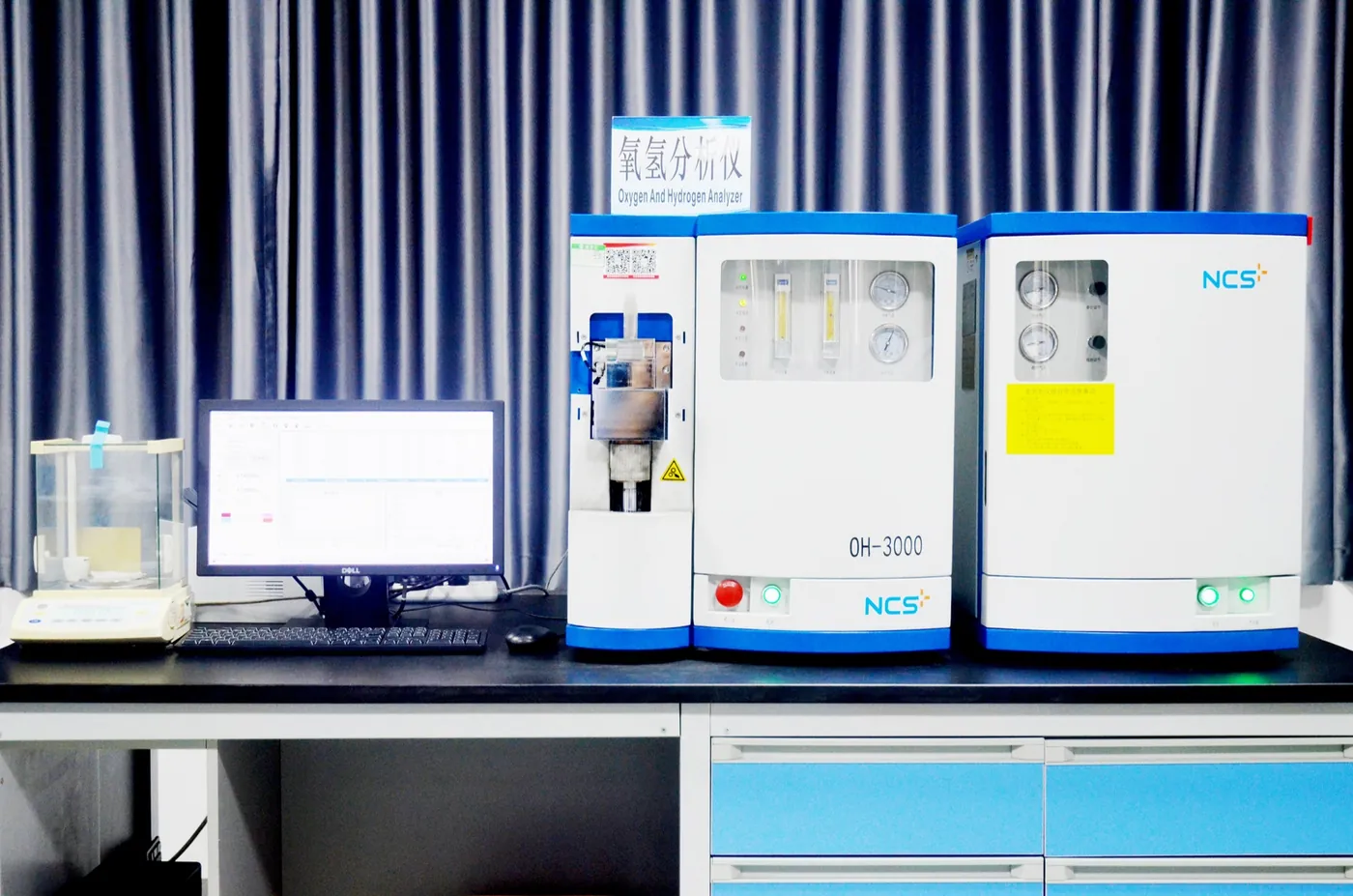 Oxygen nitrogen hydrogen analysis instrument on a laboratory bench